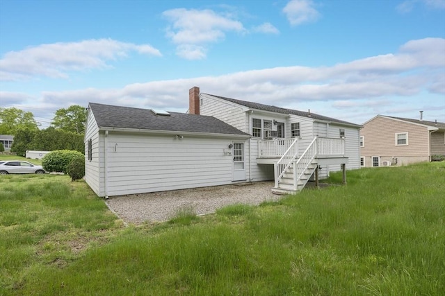 28 Marks Rd, Weymouth, MA 02189 - rear view of house featuring a deck, a chimney, roof with shingles, and stairs