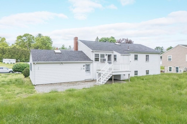 28 Marks Rd, Weymouth, MA 02189 - back of property featuring a chimney, stairway, a wooden deck, roof with shingles, and a lawn