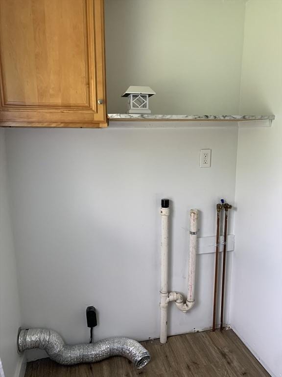 23 A St, North Adams, MA 01220 - washroom with cabinet space and wood finished floors