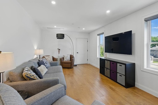 9 Boston St Unit 3, Salem, MA 01970 - living area with light wood finished floors, recessed lighting, and baseboards