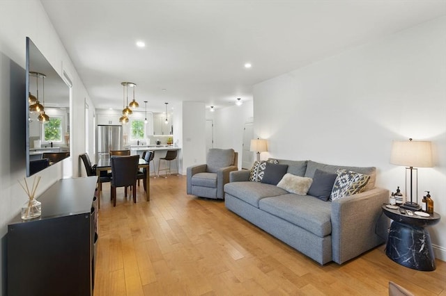 9 Boston St Unit 3, Salem, MA 01970 - living room featuring light wood-type flooring and recessed lighting