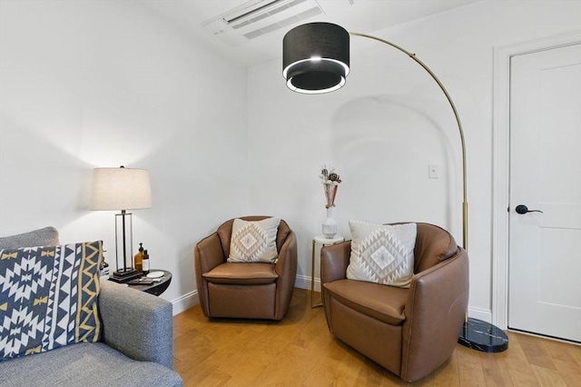 9 Boston St Unit 3, Salem, MA 01970 - living area featuring light wood-style flooring and baseboards