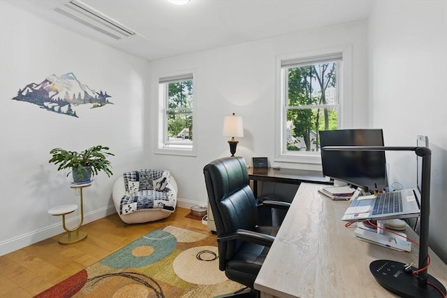 9 Boston St Unit 3, Salem, MA 01970 - home office featuring wood finished floors and baseboards