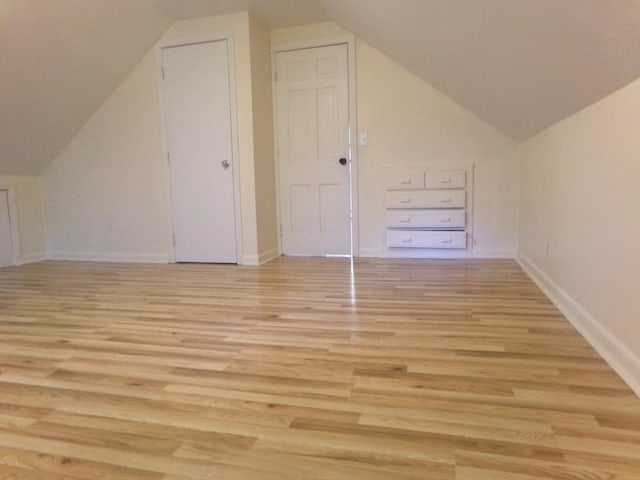 19 Saint Anns Ln, Falmouth, MA 02536 - additional living space with vaulted ceiling and light wood-style floors