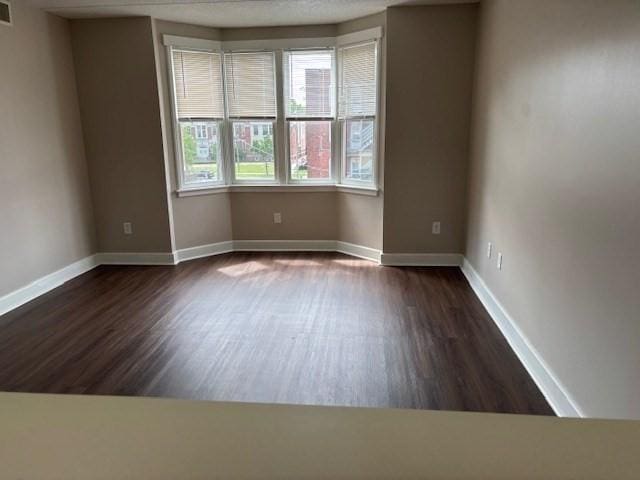 34 Sumner Ave Unit 302, Springfield, MA 01108 - empty room featuring wood finished floors and baseboards