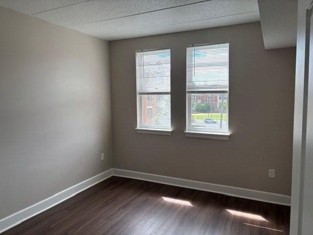 34 Sumner Ave Unit 302, Springfield, MA 01108 - unfurnished room featuring dark wood finished floors and baseboards