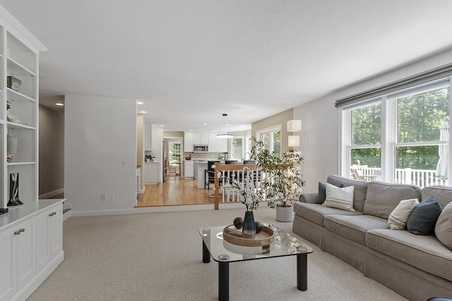 5 Mckinley Dr, Acton, MA 01720 - living room featuring baseboards and light carpet