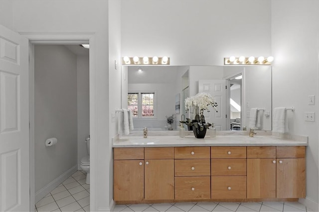 5 Mckinley Dr, Acton, MA 01720 - bathroom featuring double vanity, toilet, tile patterned flooring, a shower with door, and baseboards