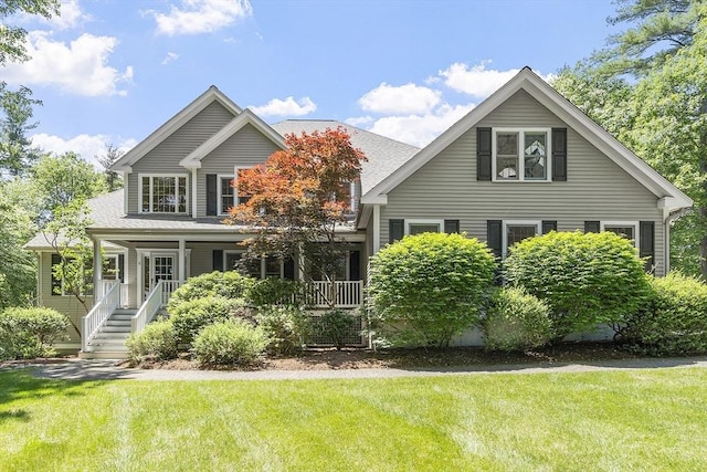 5 Mckinley Dr, Acton, MA 01720 - view of front of home with a front yard and covered porch