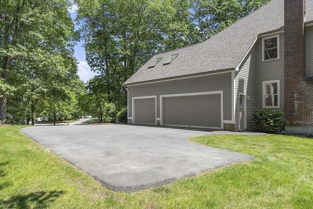 5 Mckinley Dr, Acton, MA 01720 - view of side of property featuring a shingled roof, driveway, a yard, and an attached garage