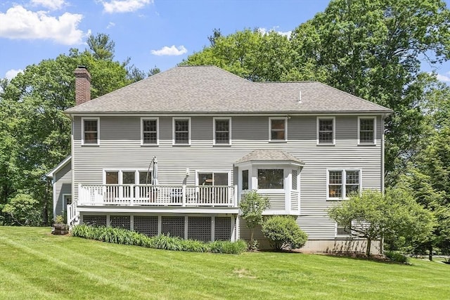 5 Mckinley Dr, Acton, MA 01720 - rear view of property with a lawn, a chimney, a wooden deck, and roof with shingles