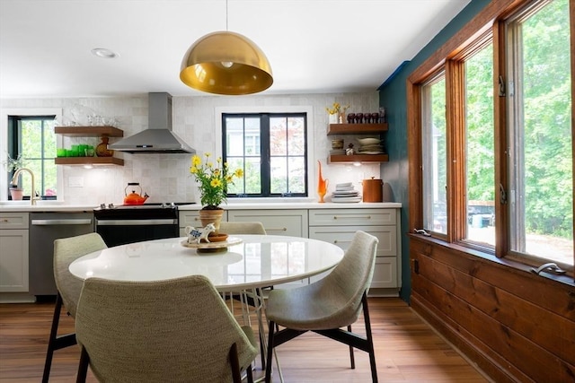 32 Fern St, Concord, MA 01742 - dining space with plenty of natural light and wood finished floors