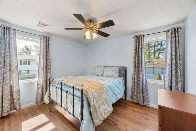 69 W Shore Rd, Holbrook, MA 02343 - bedroom with wood finished floors, baseboards, and ceiling fan