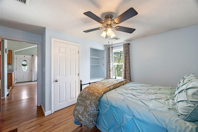 69 W Shore Rd, Holbrook, MA 02343 - bedroom with wood finished floors, baseboards, and a ceiling fan