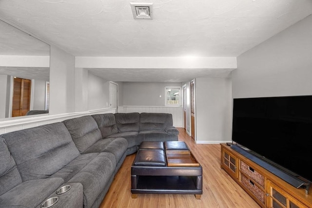 69 W Shore Rd, Holbrook, MA 02343 - living area featuring wood finished floors and baseboards