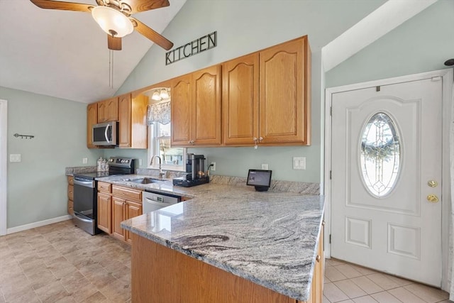 69 W Shore Rd, Holbrook, MA 02343 - kitchen with stainless steel appliances, lofted ceiling, a sink, a ceiling fan, and light stone countertops