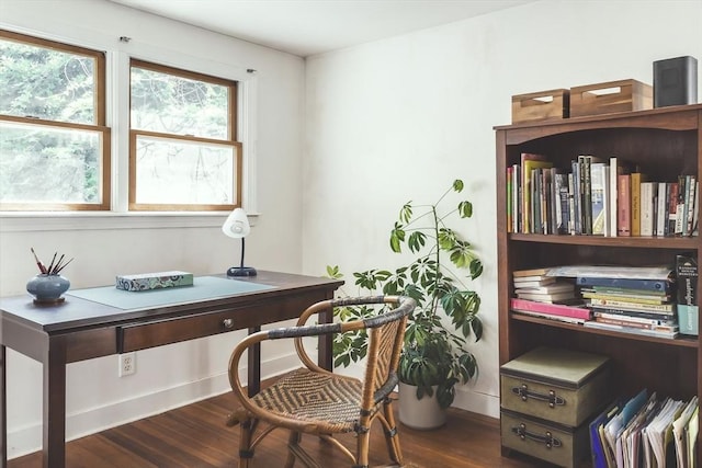 office area featuring baseboards and dark wood-style flooring