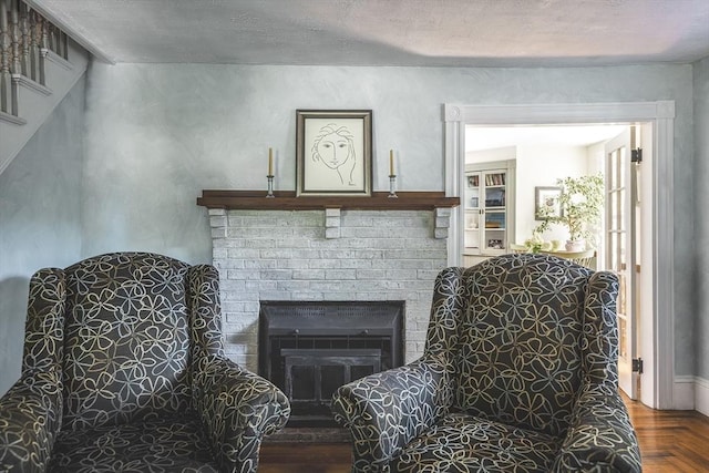 living area featuring a fireplace