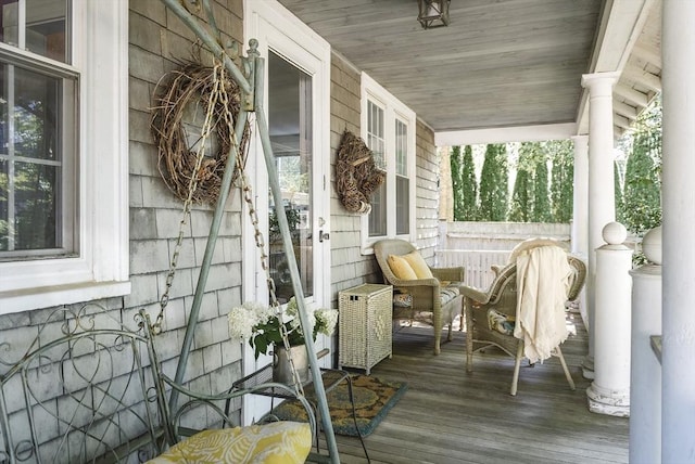 wooden deck featuring a porch