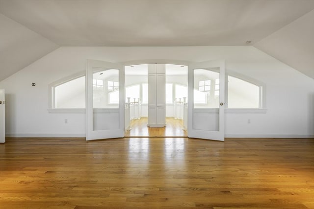 240 Atlantic Rd, Gloucester, MA 01930 - additional living space with lofted ceiling and wood finished floors