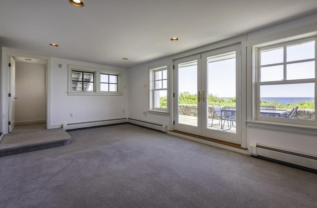 240 Atlantic Rd, Gloucester, MA 01930 - carpeted spare room featuring recessed lighting, a baseboard heating unit, french doors, and baseboards