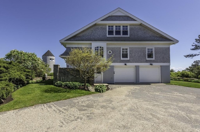 240 Atlantic Rd, Gloucester, MA 01930 - view of front of home with driveway, a garage, and a front lawn