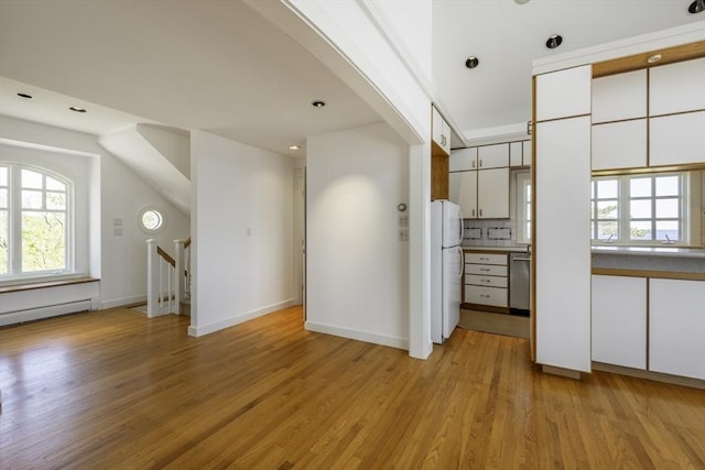 240 Atlantic Rd, Gloucester, MA 01930 - kitchen featuring freestanding refrigerator, light wood-style flooring, dishwasher, white cabinets, and recessed lighting