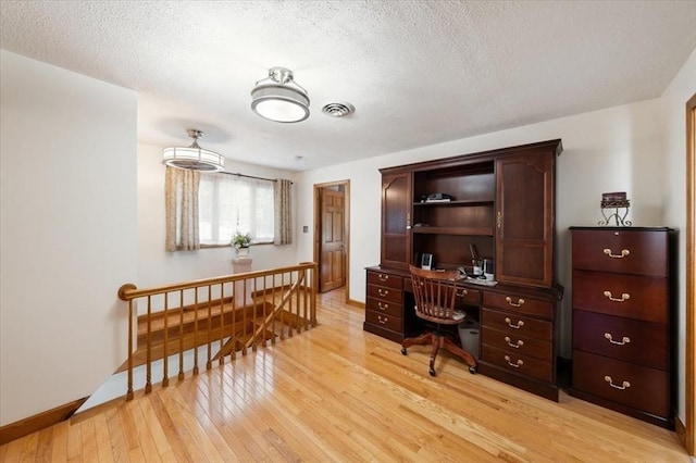 472 Potter Rd, Framingham, MA 01701 - office featuring light wood finished floors and a textured ceiling
