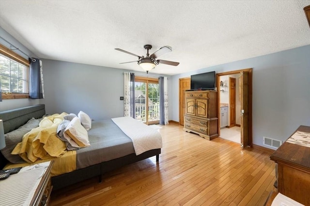 472 Potter Rd, Framingham, MA 01701 - bedroom featuring access to exterior, light wood-type flooring, ceiling fan, and a textured ceiling