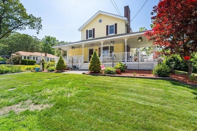 472 Potter Rd, Framingham, MA 01701 - rear view of property with covered porch, a yard, and a chimney
