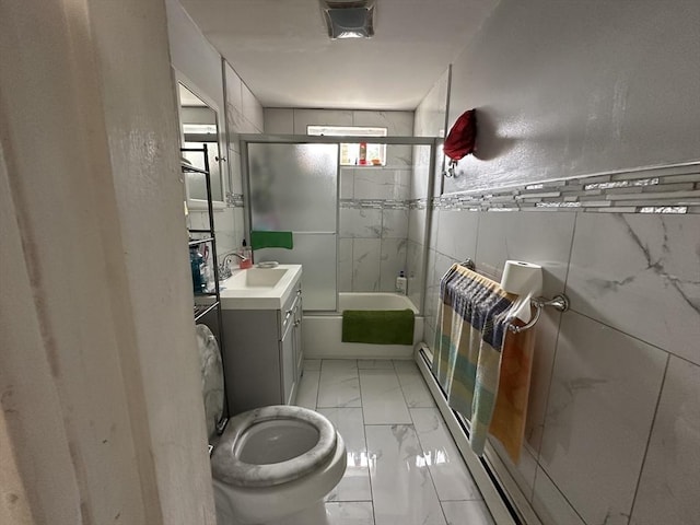 89-91 Cambridge St, Lawrence, MA 01843 - full bath with marble finish floors, vanity, enclosed tub / shower combo, and radiator heating unit