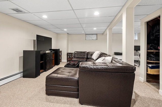 living area featuring recessed lighting, visible vents, and light colored carpet