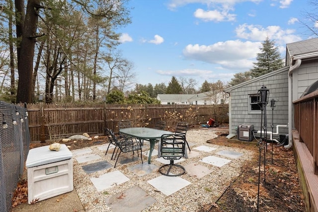 view of patio / terrace with a fenced backyard and outdoor dining space