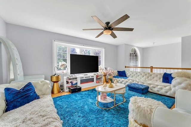 living room featuring ceiling fan