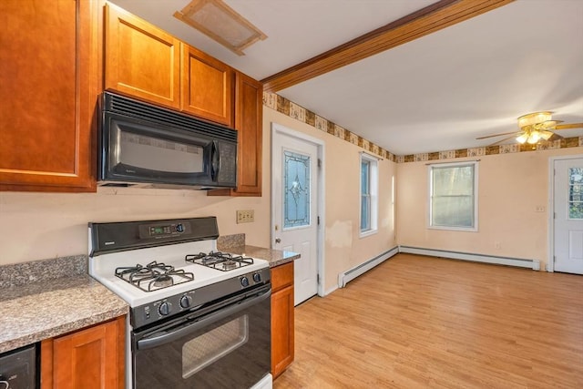 kitchen with light wood-type flooring, stainless steel dishwasher, ceiling fan, and white gas stove