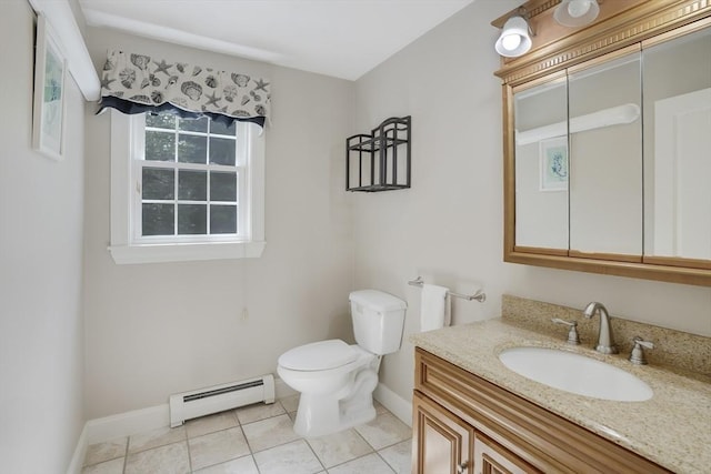 71 Sixth St N, Edgartown, MA 02539 - bathroom featuring a baseboard radiator, baseboards, toilet, vanity, and tile patterned flooring
