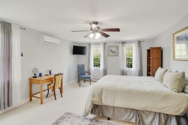 71 Sixth St N, Edgartown, MA 02539 - bedroom with a wall mounted air conditioner, light colored carpet, baseboards, and a ceiling fan