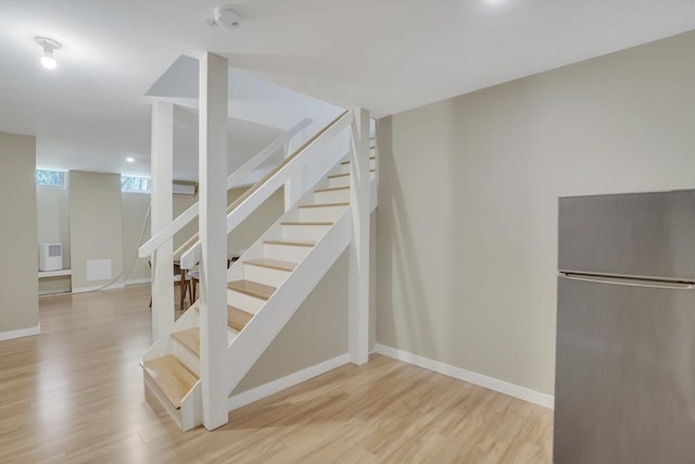 71 Sixth St N, Edgartown, MA 02539 - staircase with wood finished floors and baseboards