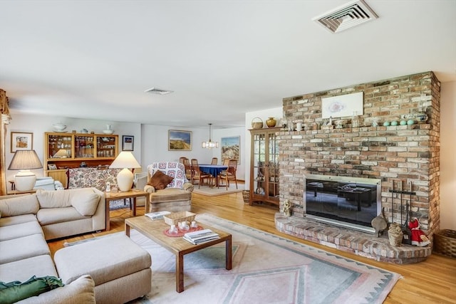 72 Highland Rd, Truro, MA 02666 - living room with wood finished floors and a fireplace