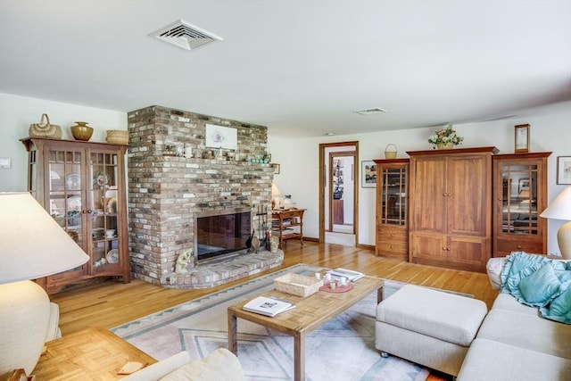 72 Highland Rd, Truro, MA 02666 - living area with light wood-style flooring and a fireplace