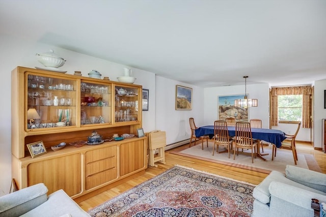 72 Highland Rd, Truro, MA 02666 - living room featuring light wood finished floors and a chandelier