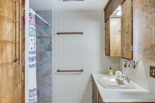 72 Highland Rd, Truro, MA 02666 - bathroom with vanity, tile walls, and a shower with shower curtain