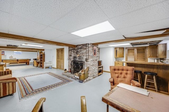 72 Highland Rd, Truro, MA 02666 - living room featuring a fireplace, bar area, and a drop ceiling