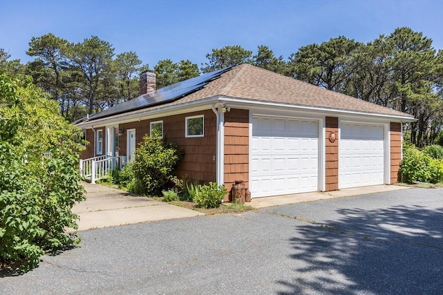 72 Highland Rd, Truro, MA 02666 - detached garage featuring solar panels