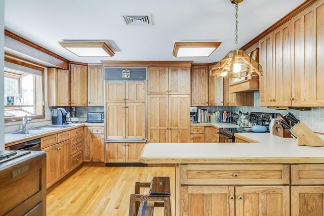 72 Highland Rd, Truro, MA 02666 - kitchen with stainless steel electric range oven, tasteful backsplash, a peninsula, light wood-type flooring, and light countertops
