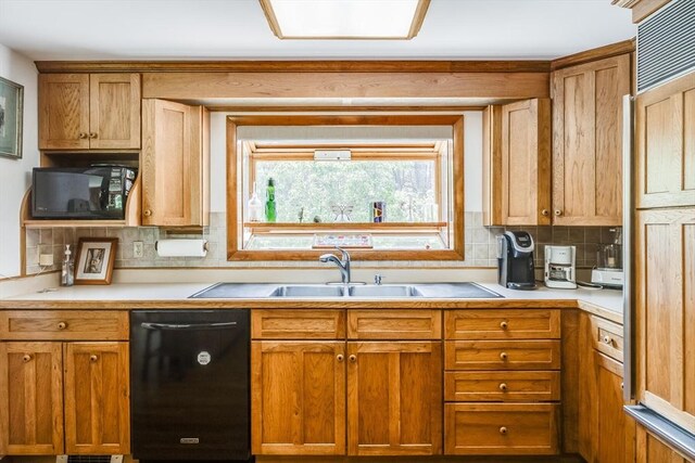 72 Highland Rd, Truro, MA 02666 - kitchen with black appliances, decorative backsplash, light countertops, and brown cabinetry