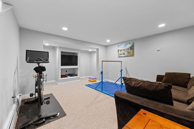 exercise room featuring a baseboard radiator, carpet, baseboards, and recessed lighting