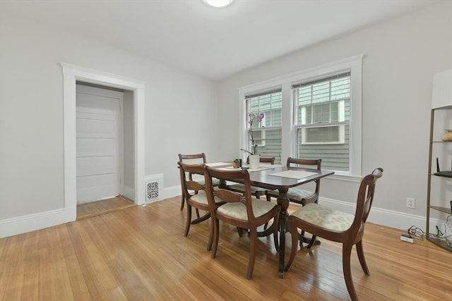 6 Brewer St Unit 2, Cambridge, MA 02138 - dining room featuring baseboards and light wood finished floors