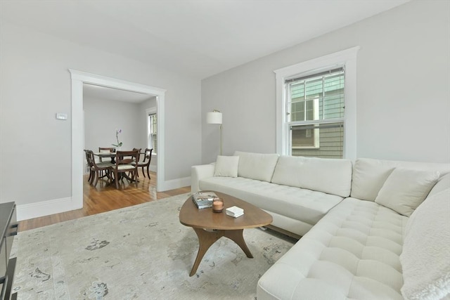6 Brewer St Unit 2, Cambridge, MA 02138 - living room featuring wood finished floors and healthy amount of natural light