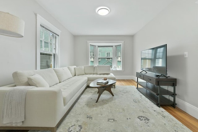 6 Brewer St Unit 2, Cambridge, MA 02138 - living room featuring wood finished floors and baseboards